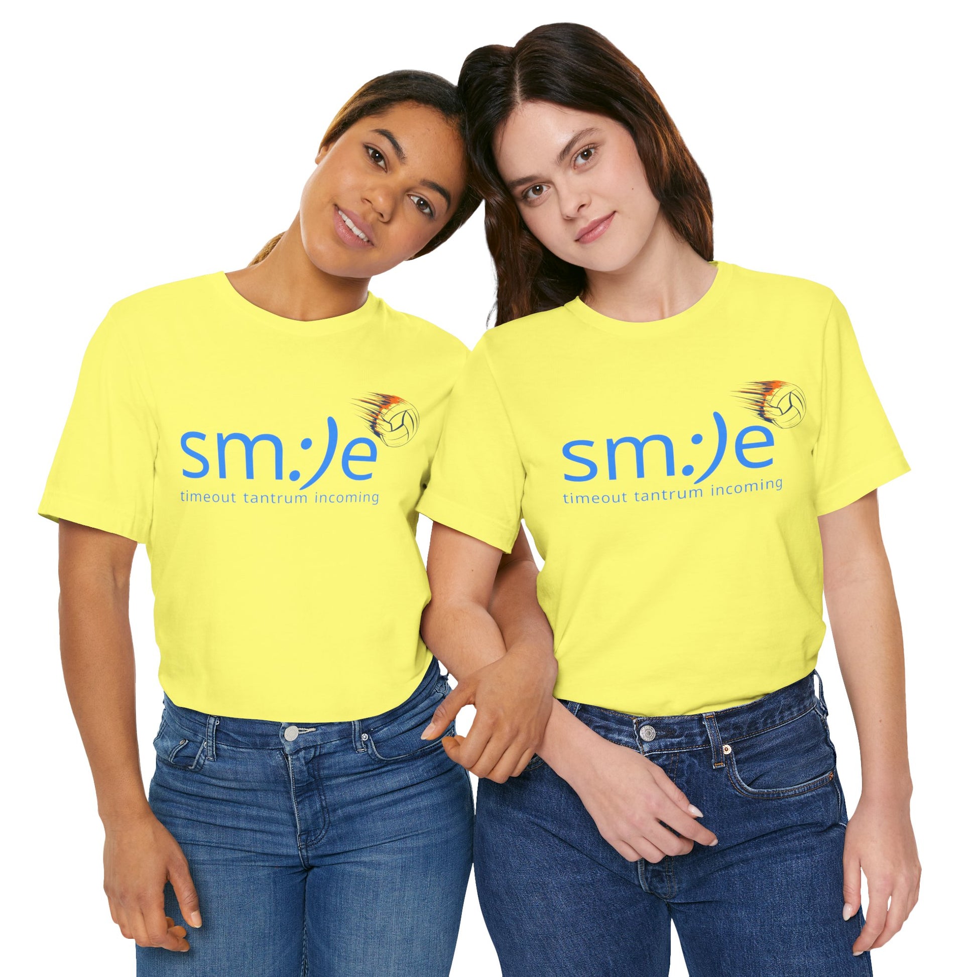 Two people wearing yellow shirts with a smiley face design on a white background