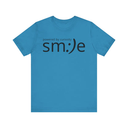 sm:)e Powered by Curiosity T-Shirt | Inspirational Unisex Graphic Tee