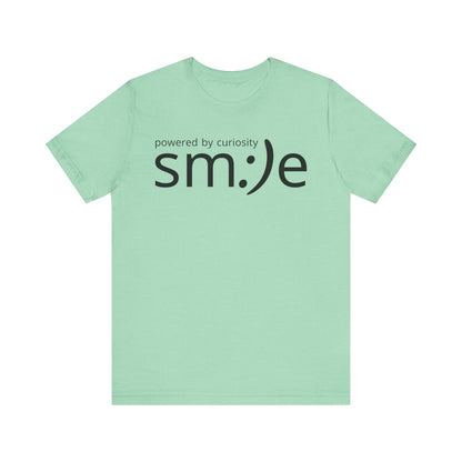 sm:)e Powered by Curiosity T-Shirt | Inspirational Unisex Graphic Tee