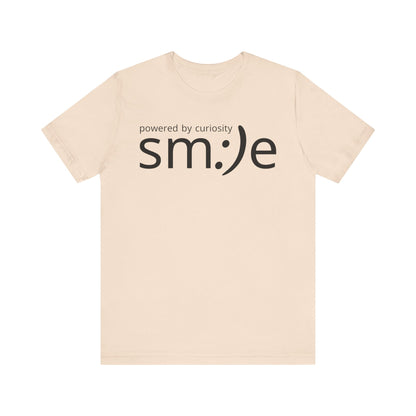 sm:)e Powered by Curiosity T-Shirt | Inspirational Unisex Graphic Tee