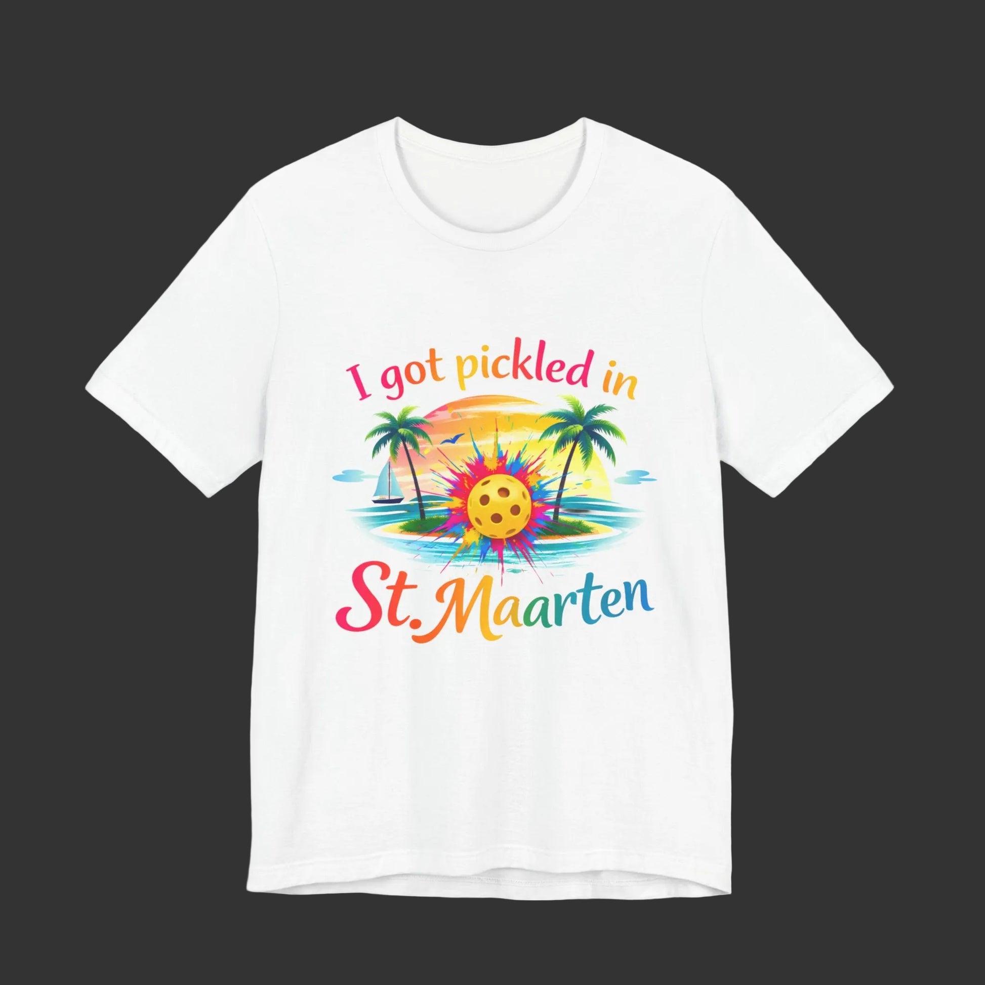 White t-shirt with colorful graphic and text 'I got pickled in St. Maarten' on a white background