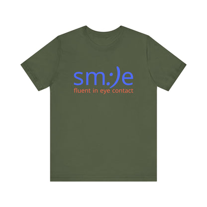 Green t-shirt with blue and red text on a white background