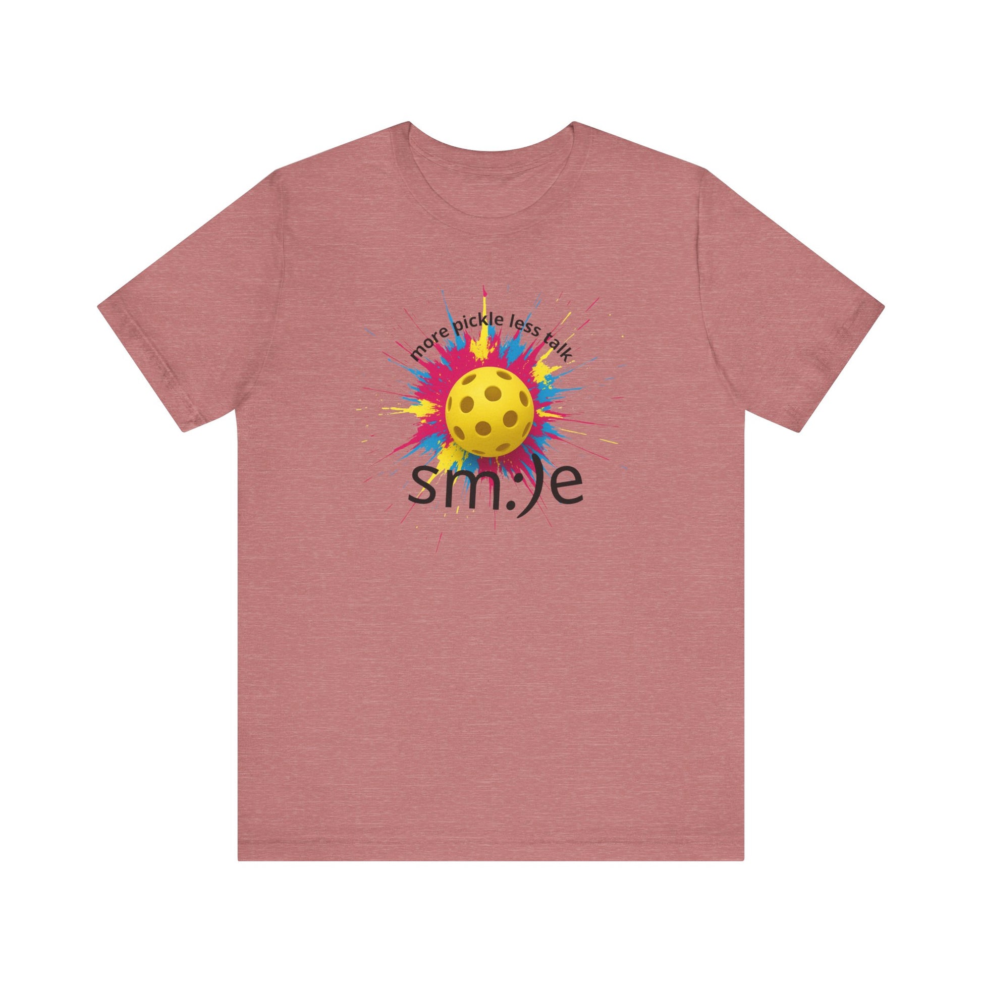 Pink t-shirt with a colorful pickleball design and 'smile' text on a white background