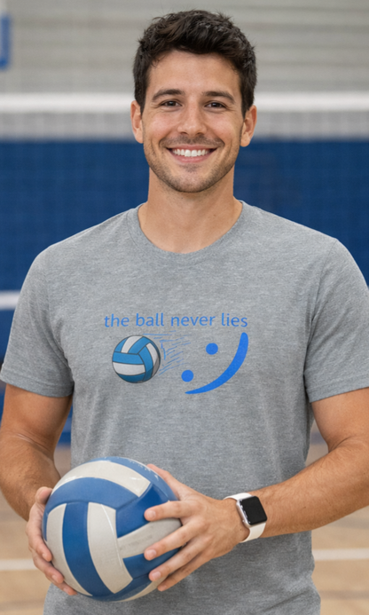 Man holding a volleyball wearing a gray t-shirt with a logo and text.